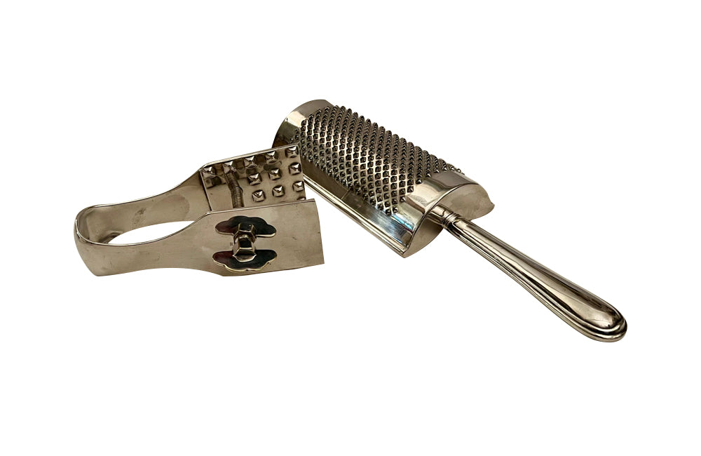 Elegant Mid-Century silver plate cheese clamp and grater set.