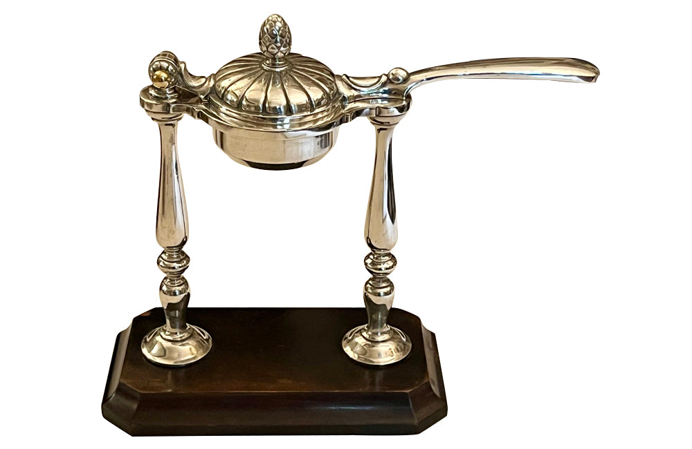 Elegant 20th Century French silver plated citrus press.