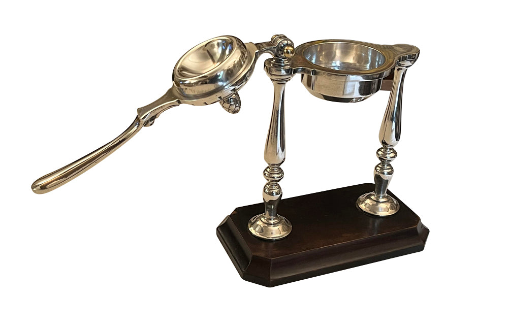 Elegant 20th Century French silver plated citrus press.