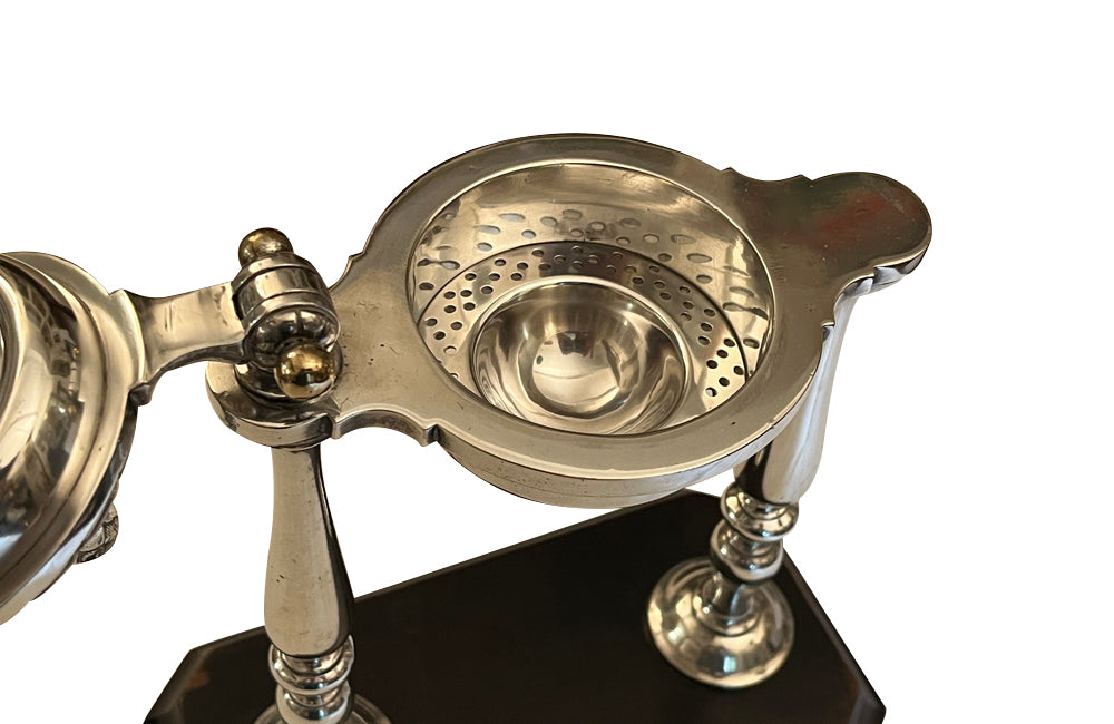 Elegant 20th Century French silver plated citrus press.