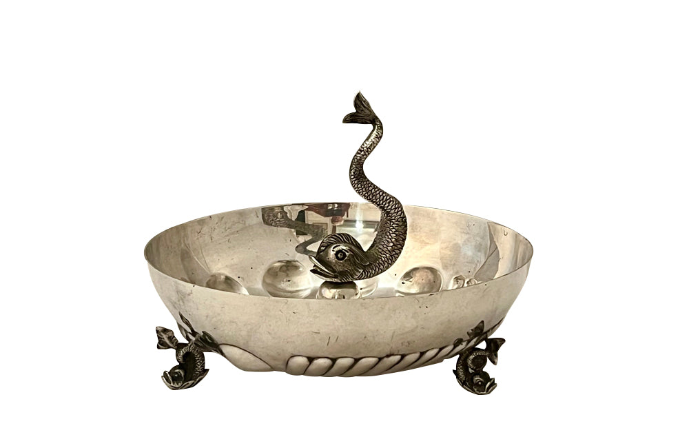 Decorative silver plate bowl with central dolphin finial on three raised feet also in the form of dolphins circa 1970