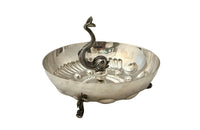 Decorative silver plate bowl with central dolphin finial on three raised feet also in the form of dolphins circa 1970