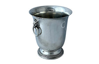 Elegant 20th Century French silver plate champagne bucket or wine cooler with lions head ringed handles.