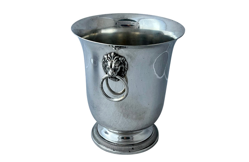 Elegant 20th Century French silver plate champagne bucket or wine cooler with lions head ringed handles.