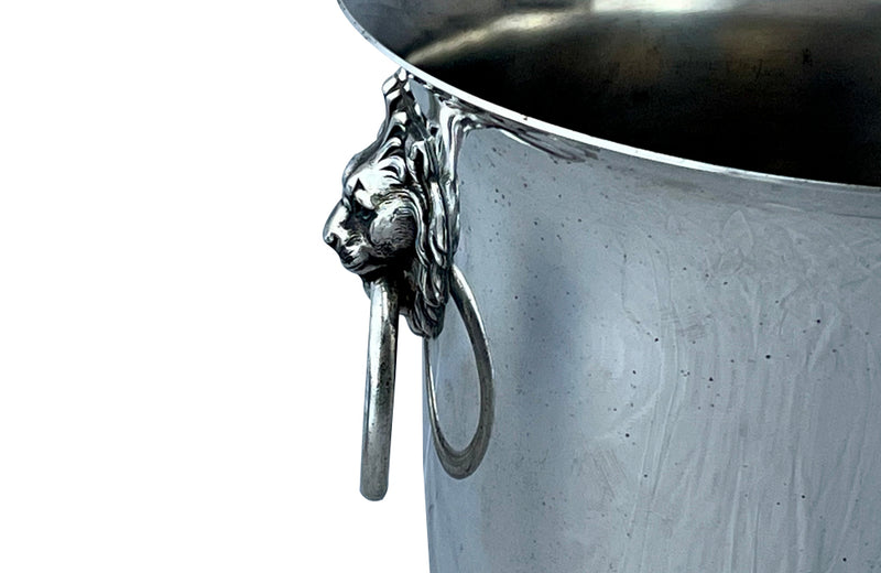 Elegant 20th Century French silver plate champagne bucket or wine cooler with lions head ringed handles.