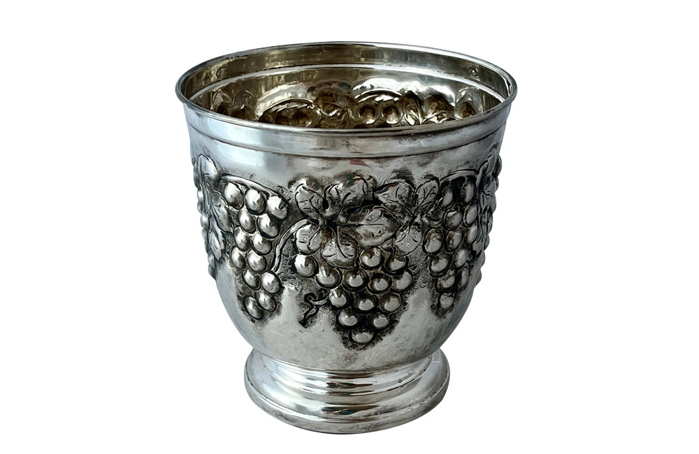 Mid-Century French silver plate decorative champagne bucket with embossed fruiting grape vine decoration.