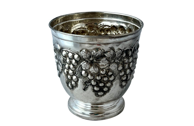 Mid-Century French silver plate decorative champagne bucket with embossed fruiting grape vine decoration.