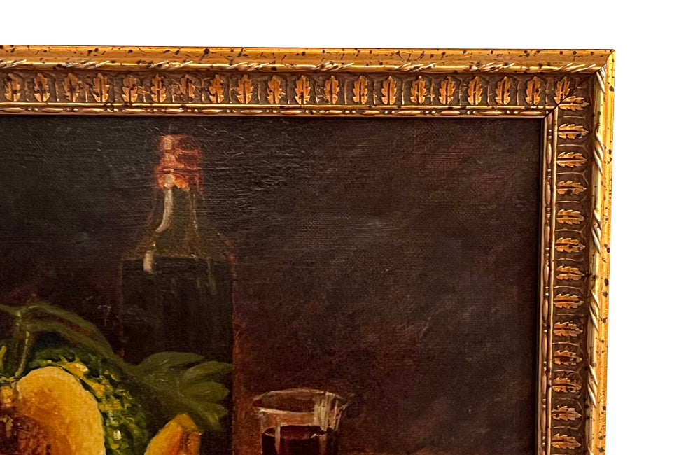 Small early 20th century French still life oil on canvas painting of a table with melon, salt, pepper , knife and wine - French Antiques