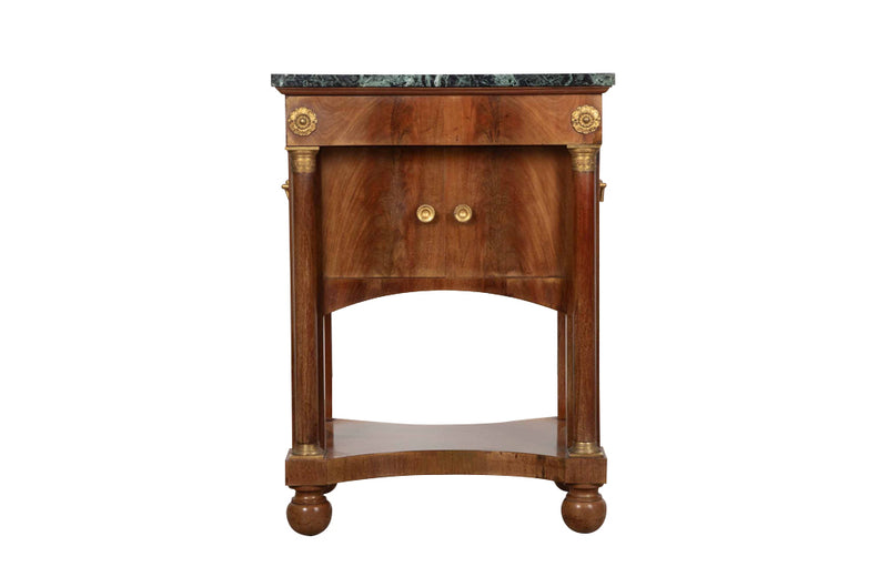 Small Empire syle side table with green marble top, upper drawer,  2 door cupboard and lower shelf by Rinck