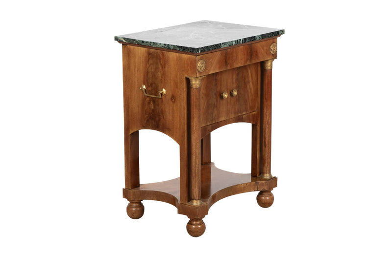 Small Empire syle side table with green marble top, upper drawer,  2 door cupboard and lower shelf by Rinck