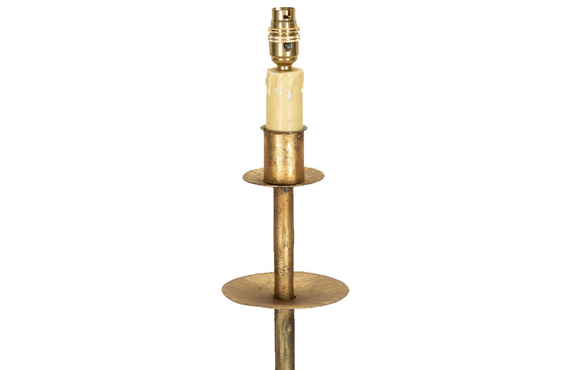 Mid century floor lamp gilt iron with ringed decorative stem on a tripod. Spanish. Mid century lighting