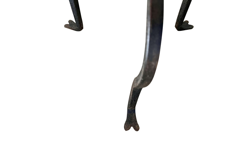 Chic little Mid-Century Spanish iron cocktail or martini table with raised rim to top.