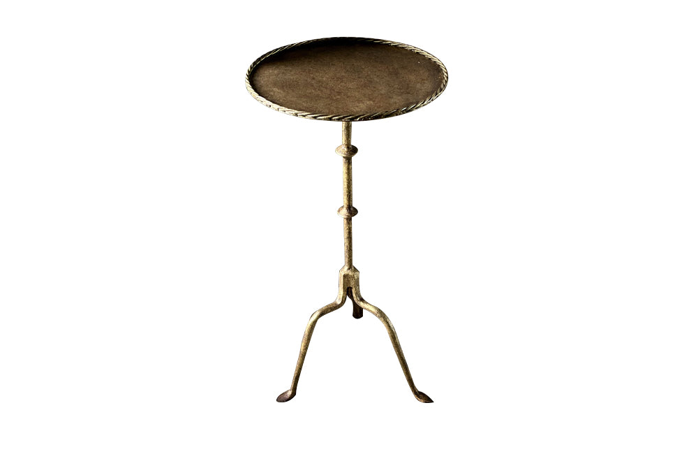 Chic little Mid-Century Spanish iron cocktail or martini table with rope rim to top.
