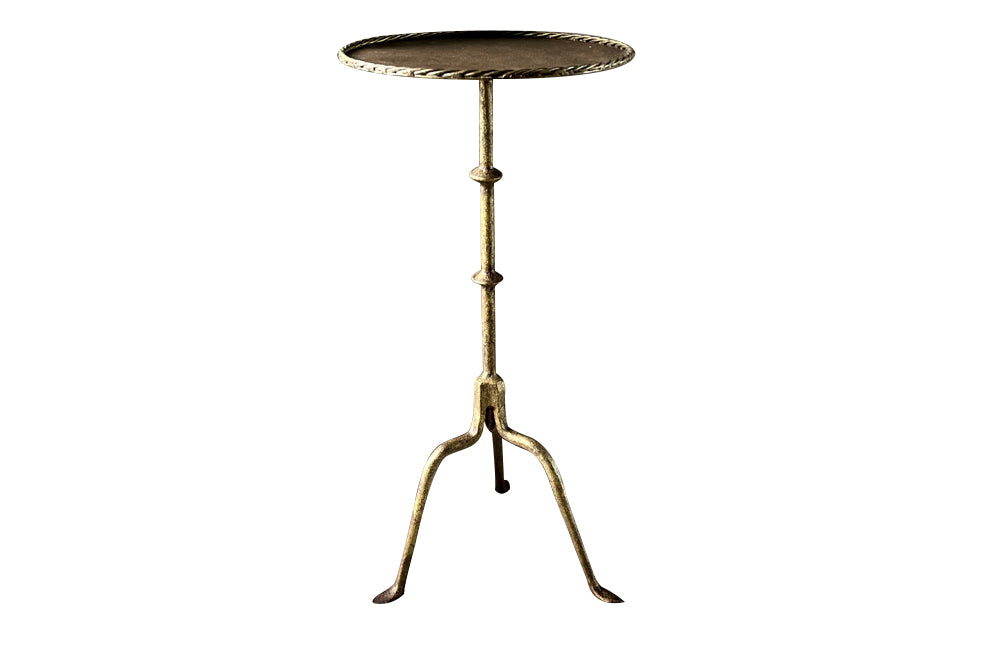 Chic little Mid-Century Spanish iron cocktail or martini table with rope rim to top.