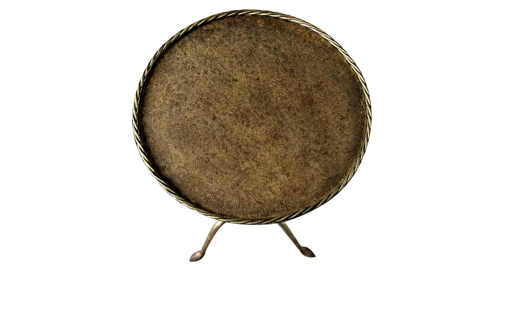 Chic little Mid-Century Spanish iron cocktail or martini table with rope rim to top.