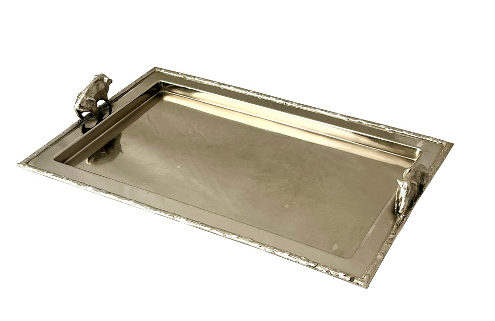 Mid Century silver plated serving tray. With faux wood surround and boar handles. in the manner of Valenti. 1950s