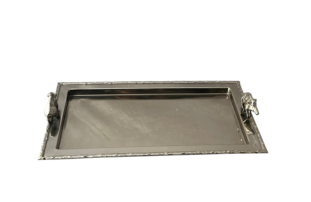 Mid Century silver plated serving tray. With faux wood surround and boar handles. in the manner of Valenti. 1950s