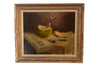 Signed French still life oil on canvas painting of a table with tablecloth and a freshly cut melon