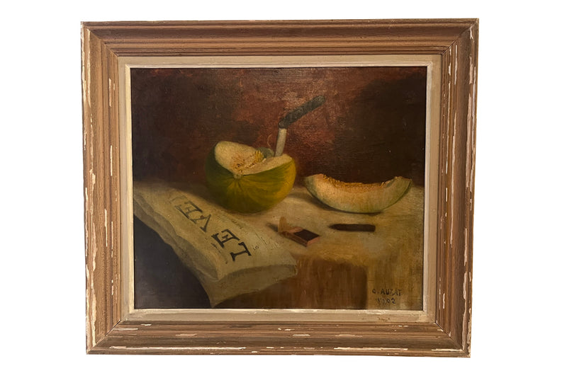 Signed French still life oil on canvas painting of a table with tablecloth and a freshly cut melon