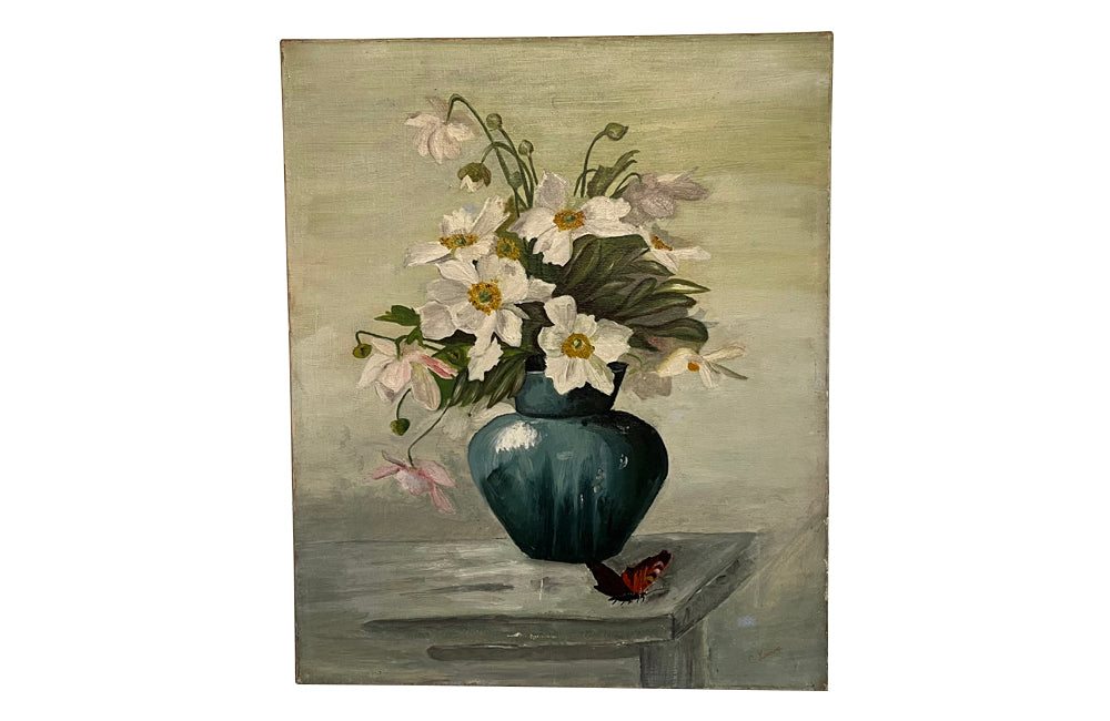 Still life oil on canvas painting depicting a blue vase of Japanese Anemones with Peacock Butterfly on a table
signed to the lower right by the artist, C. Laurent.