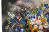 20th Century French unframed oil on canvas painting of a colourful bouquet of wildflowers in a glass vase signed by the artist L. Nuequelman 