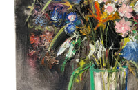 20th Century French unframed oil on canvas painting of a colourful bouquet of wildflowers in a glass vase signed by the artist L. Nuequelman 
