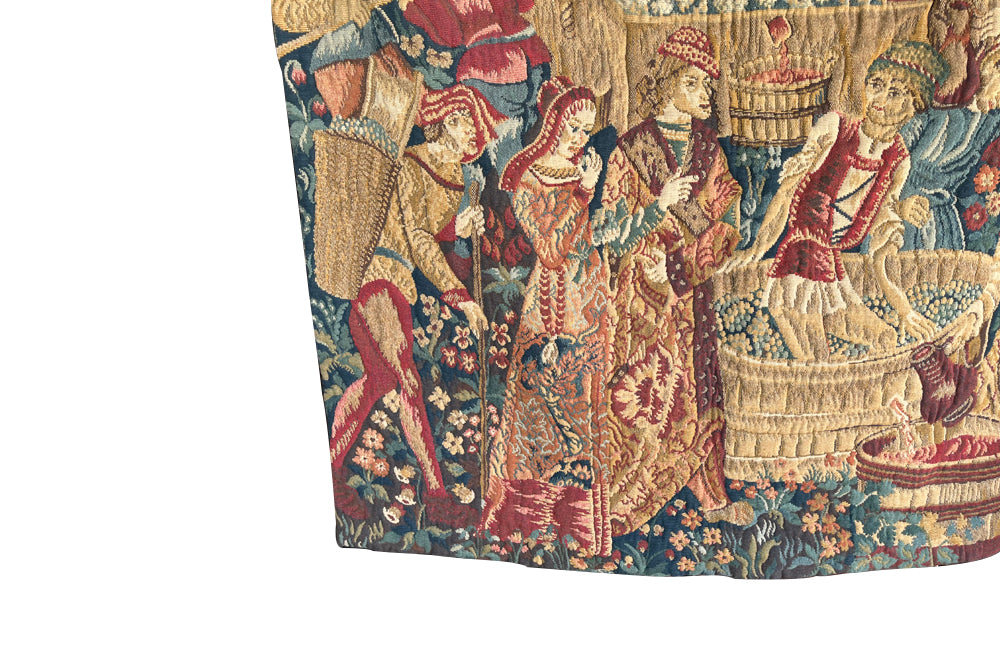 Antique tapestry wall hanging titled 'Le Pressage depicting wine pressing in XV Century Medieval times. French antiques