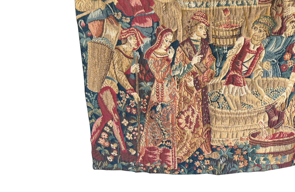 Antique tapestry wall hanging titled 'Le Pressage depicting wine pressing in XV Century Medieval times. French antiques