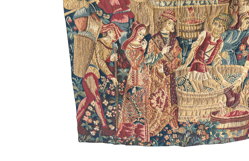 Antique tapestry wall hanging titled 'Le Pressage depicting wine pressing in XV Century Medieval times. French antiques