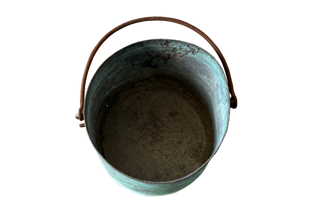 French copper vat planter with banded decoration and iron swing handle.  Drainage holes for planter use with lovely natural verdigris patination.  Early 1900s. AD & PS Antiques