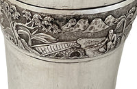 Beautiful silver plate Vietnamese cocktail shaker decorated with village scenes including fishing and
agricultural depictions