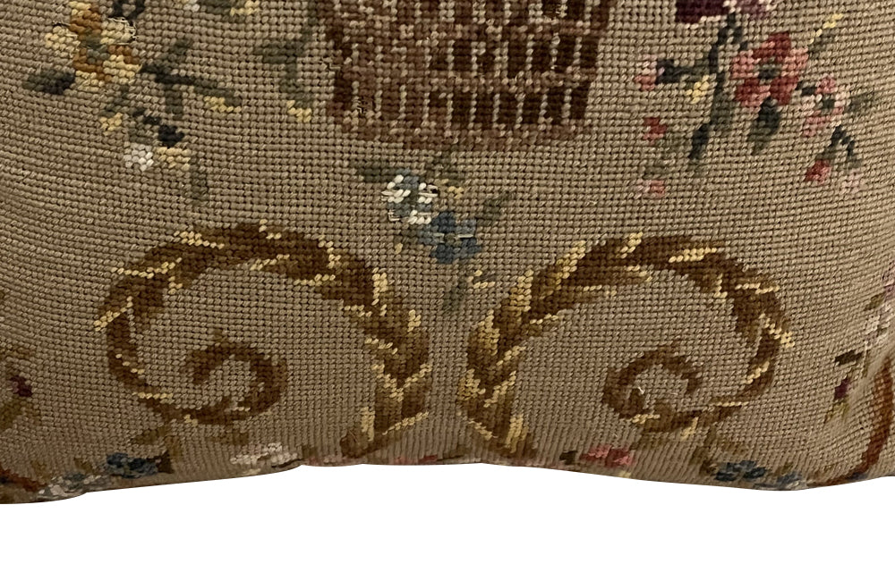 Vintage cushion needlepoint tapestry French Featuring an ornate floral basket motif with scrolling botanical details. French Antiques.