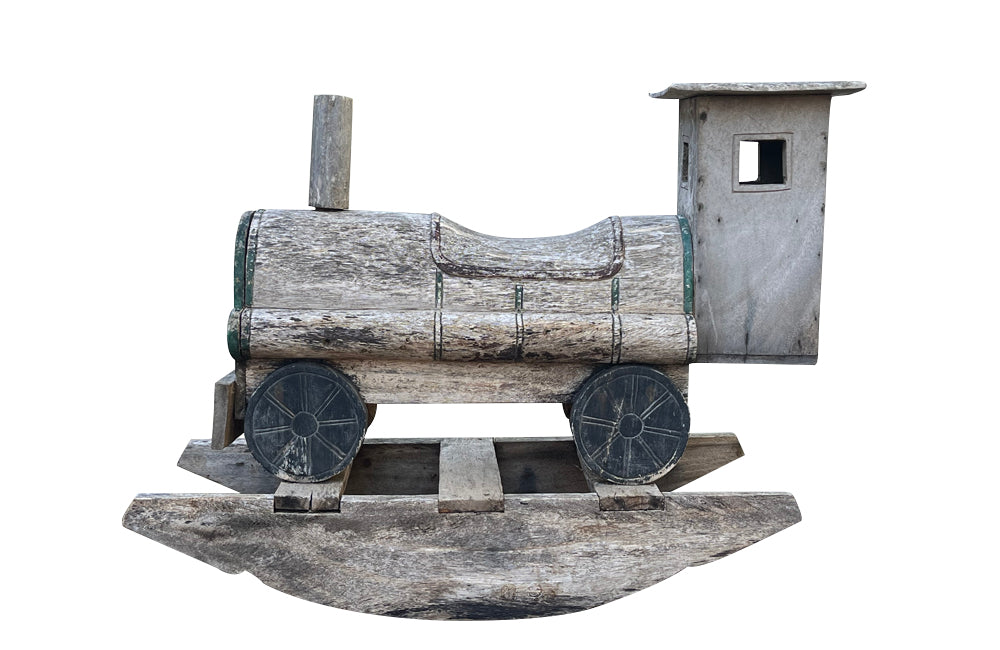 20th century 'Thomas' type tank engine rocker, of lovely weather worn wood 