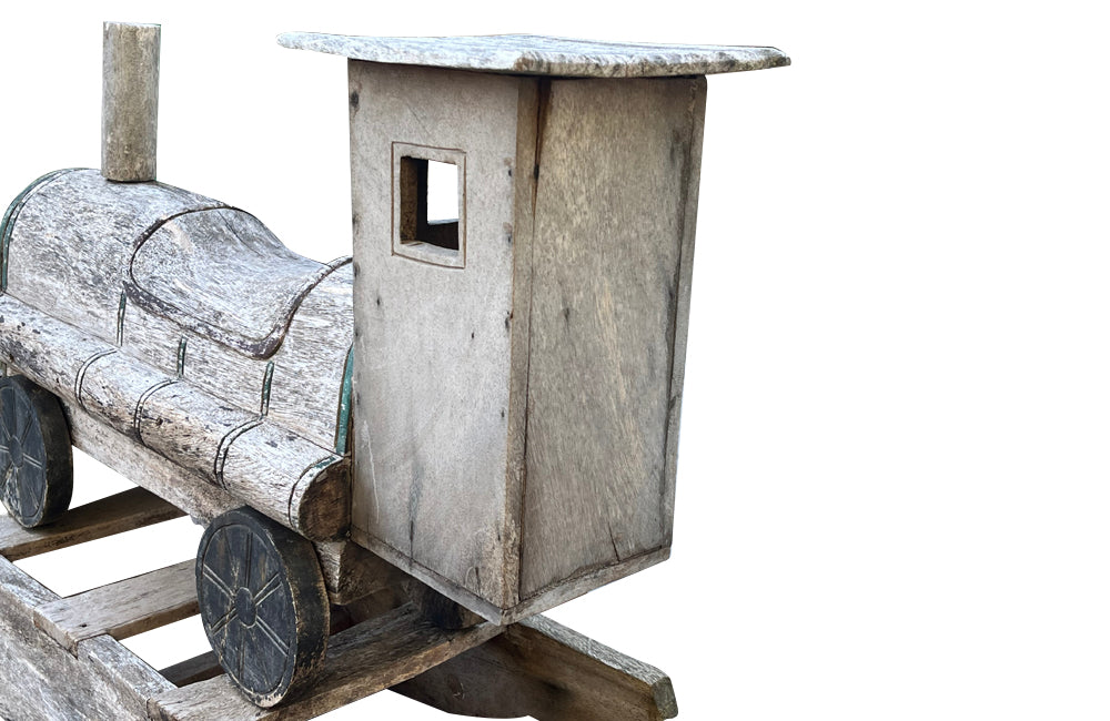 20th century 'Thomas' type tank engine rocker, of lovely weather worn wood 