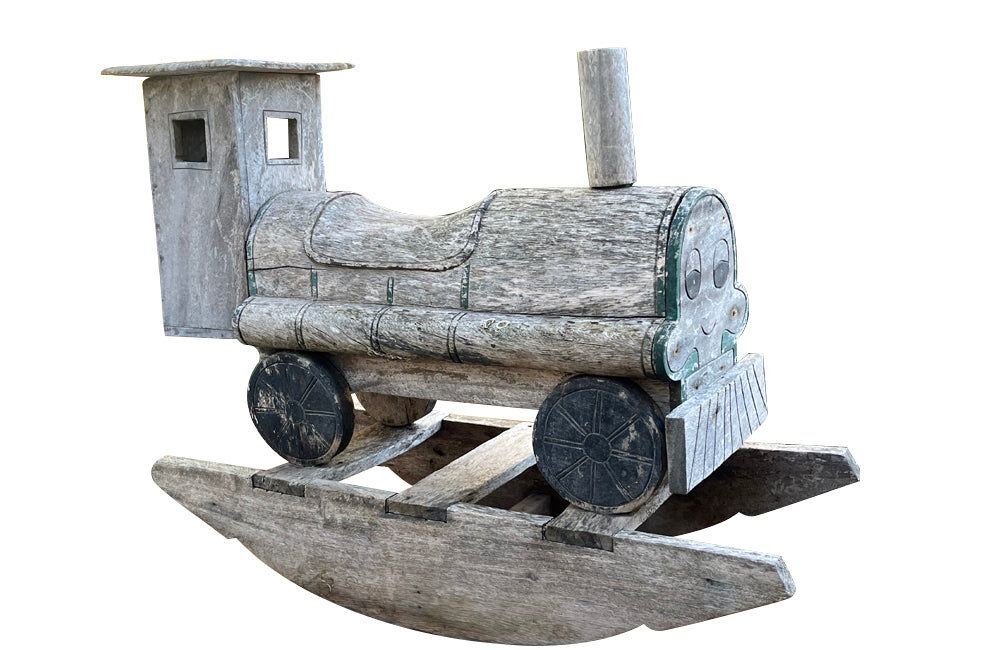 20th century 'Thomas' type tank engine rocker, of lovely weather worn wood 