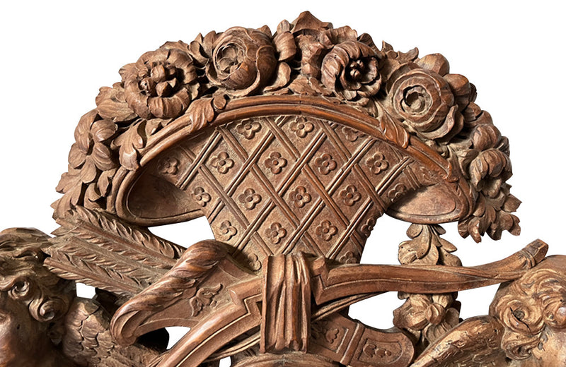 Arched hand carved walnut overbed in the Baroque style 