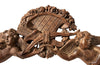 Arched hand carved walnut overbed in the Baroque style 