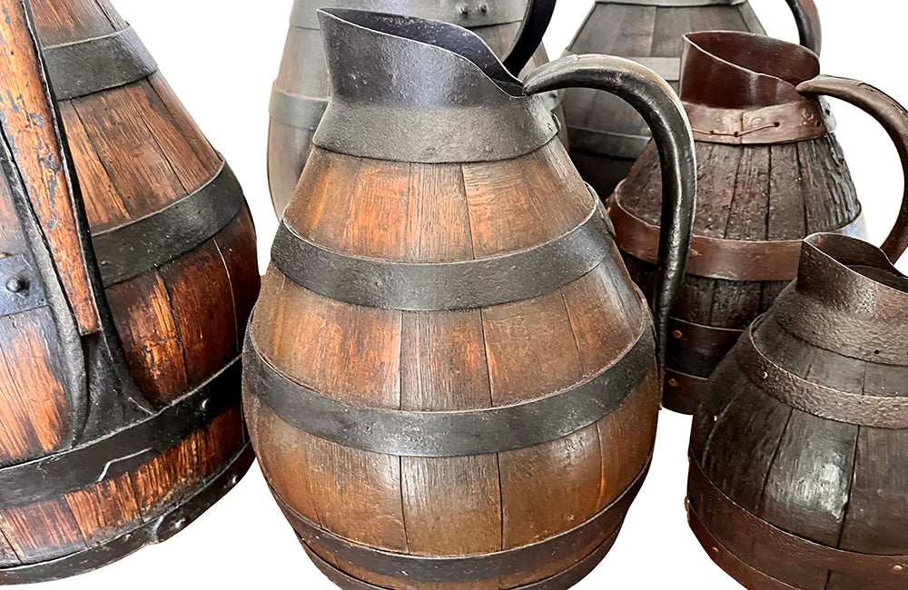 collection of six coopered wooden wine pitchers from the Burgundy region of France. Late 19th Century.