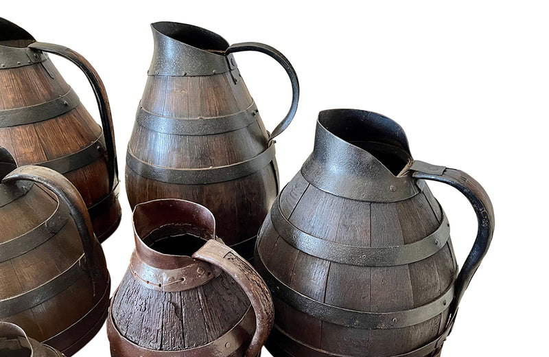 collection of six coopered wooden wine pitchers from the Burgundy region of France. Late 19th Century.