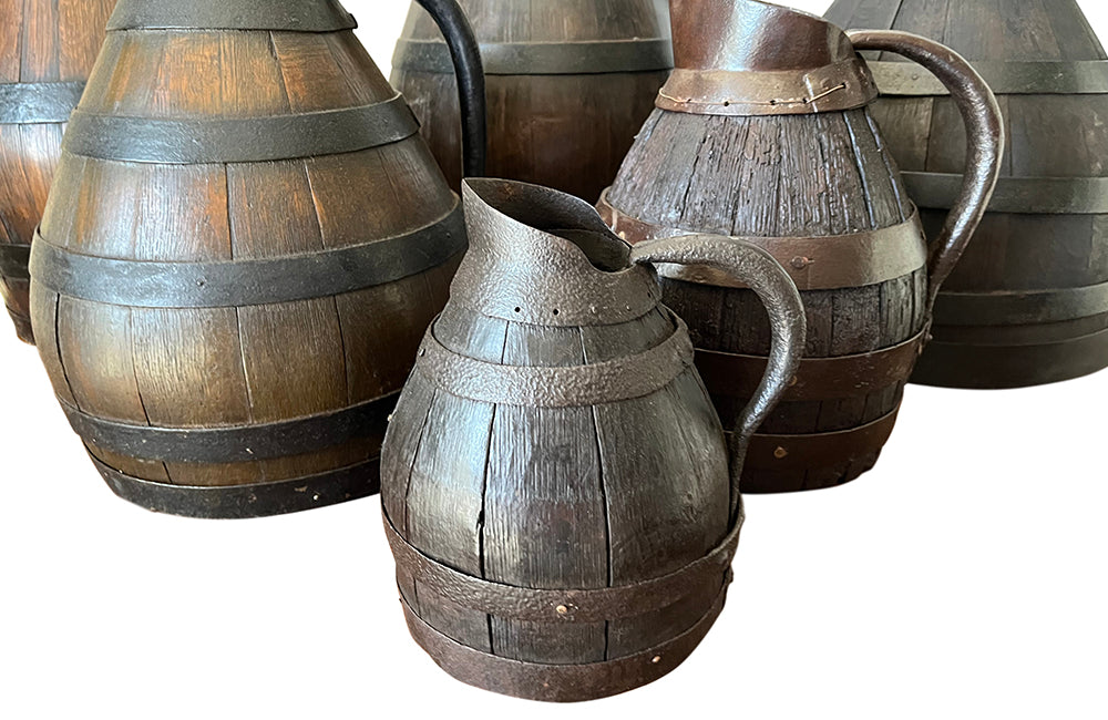collection of six coopered wooden wine pitchers from the Burgundy region of France. Late 19th Century.