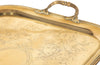 Large 19th century French brass serving tray with two handles embellished with a foliate flourish