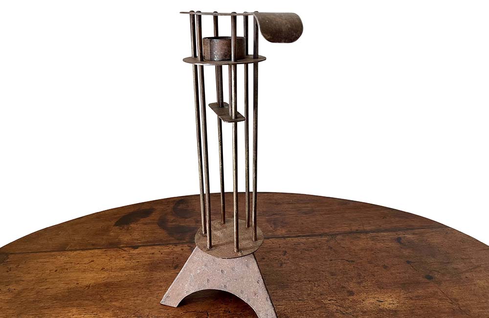  Large iron candle holder in the form of a French 'Rat de Cave' or cellar candlestick. 