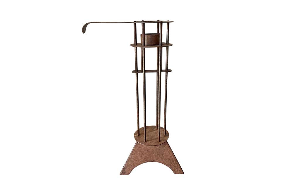  Large iron candle holder in the form of a French 'Rat de Cave' or cellar candlestick. 