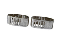 Pair of stylish Art Deco napkin rings with cut out Moi & Toi decoration [Me & You]. Circa 1930.