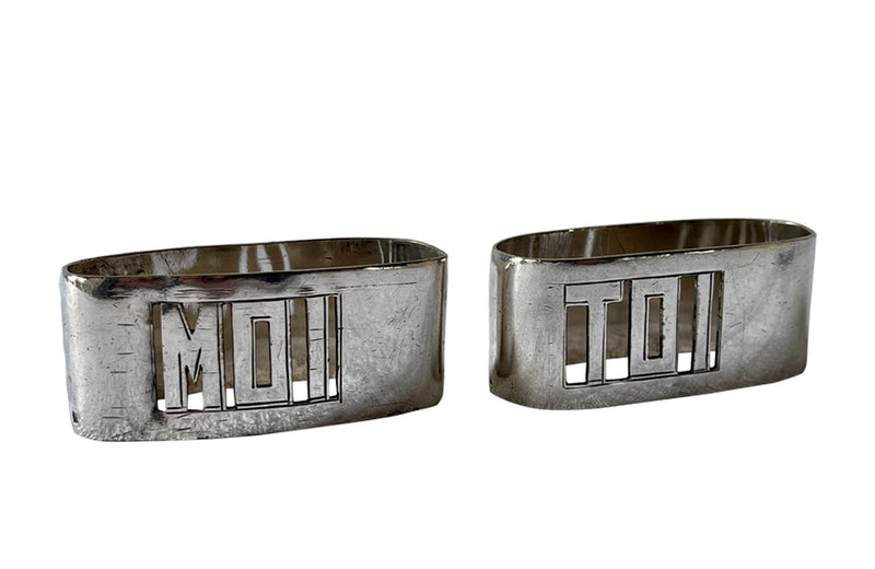 Pair of stylish Art Deco napkin rings with cut out Moi & Toi decoration [Me & You]. Circa 1930.