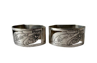 PAIR OF MADAME & MONSIEUR NAPKIN RINGS