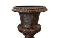 pair of beautiful French Medici terracotta urns in a faux marble glazed finish. 