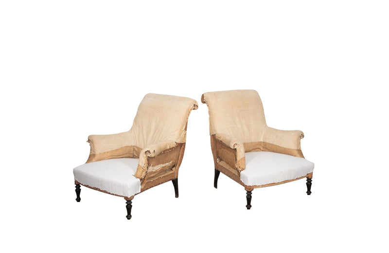 Pair of elegant strIpped French, 19th century, country house armchairs with scrolled backs.