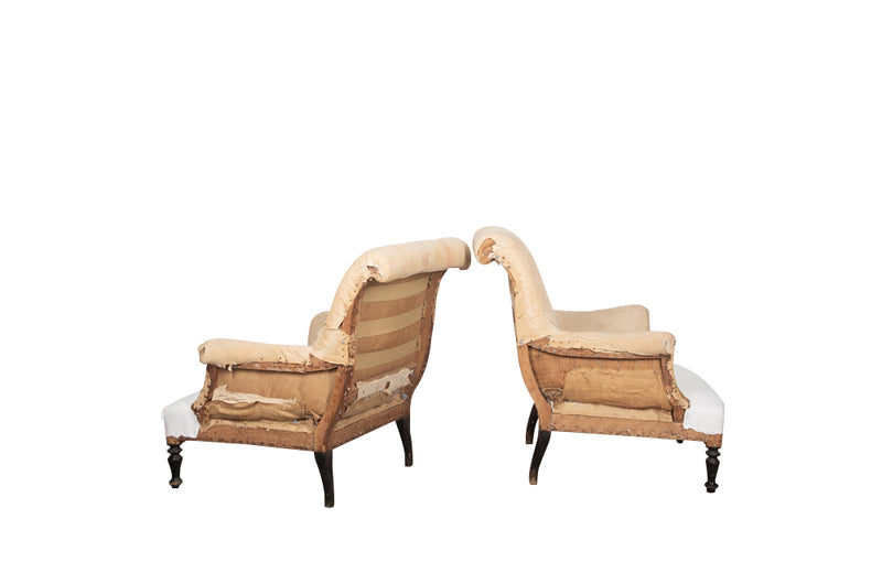 Pair of elegant strIpped French, 19th century, country house armchairs with scrolled backs.