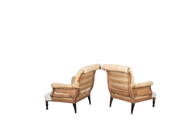 Pair of elegant strIpped French, 19th century, country house armchairs with scrolled backs.